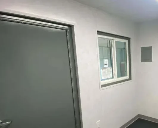 Two vinyl windows with security bars, 12,000 BTU AC w/ Heat